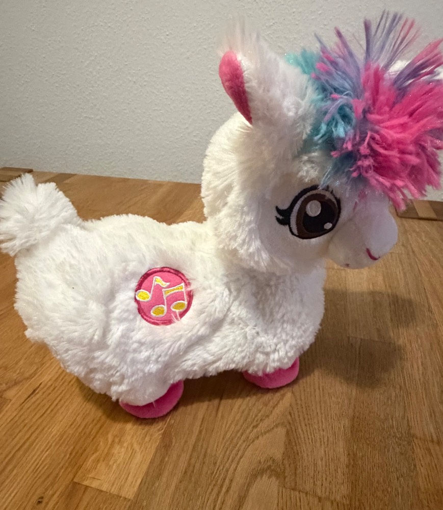 Plüschlama mit bunter Mähne und Musik-Patch